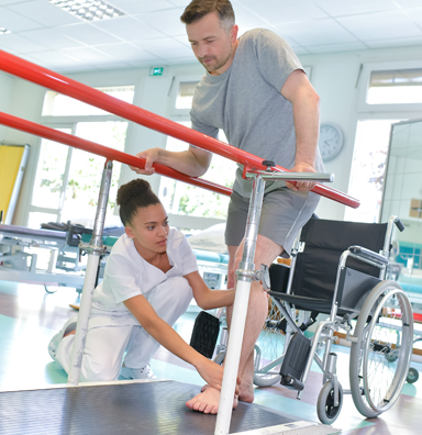 Patient learning to walk again using rails for balance