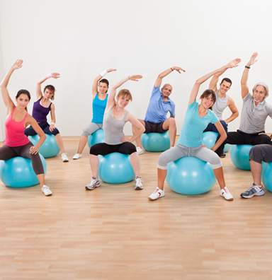 small group stretching in a Pilates studio