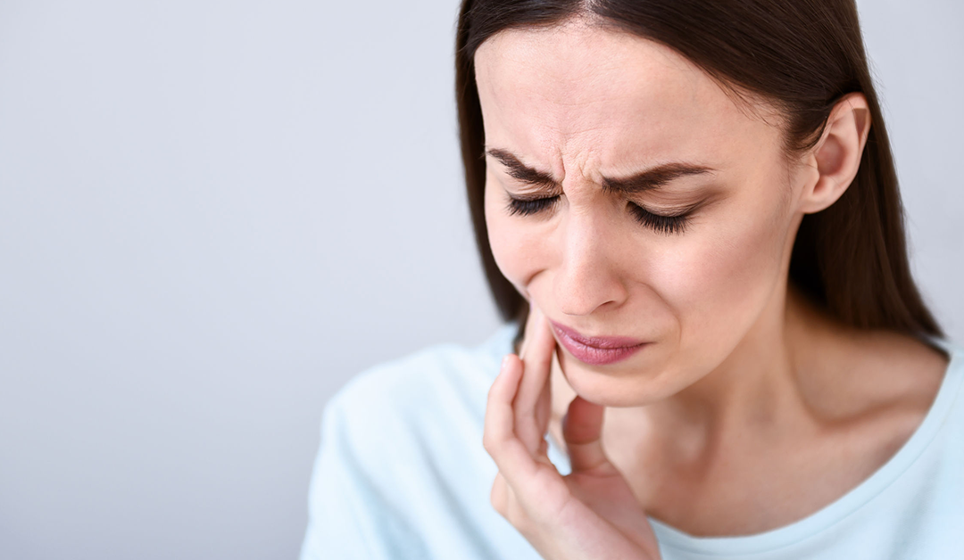 How does the Temporomandibular Joint (TMJ) cause headaches?